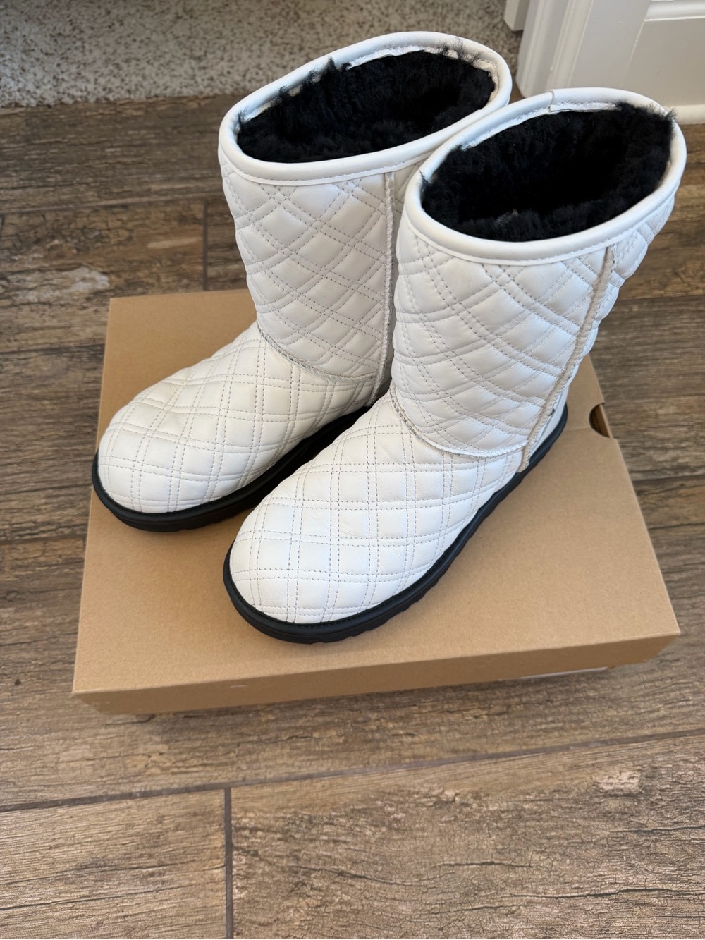 Quilted White Ugg Boots with Black Faux-Fur Lining